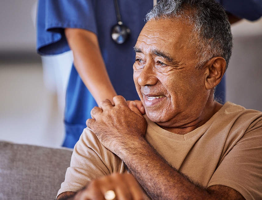 A patient receives support from a doctor